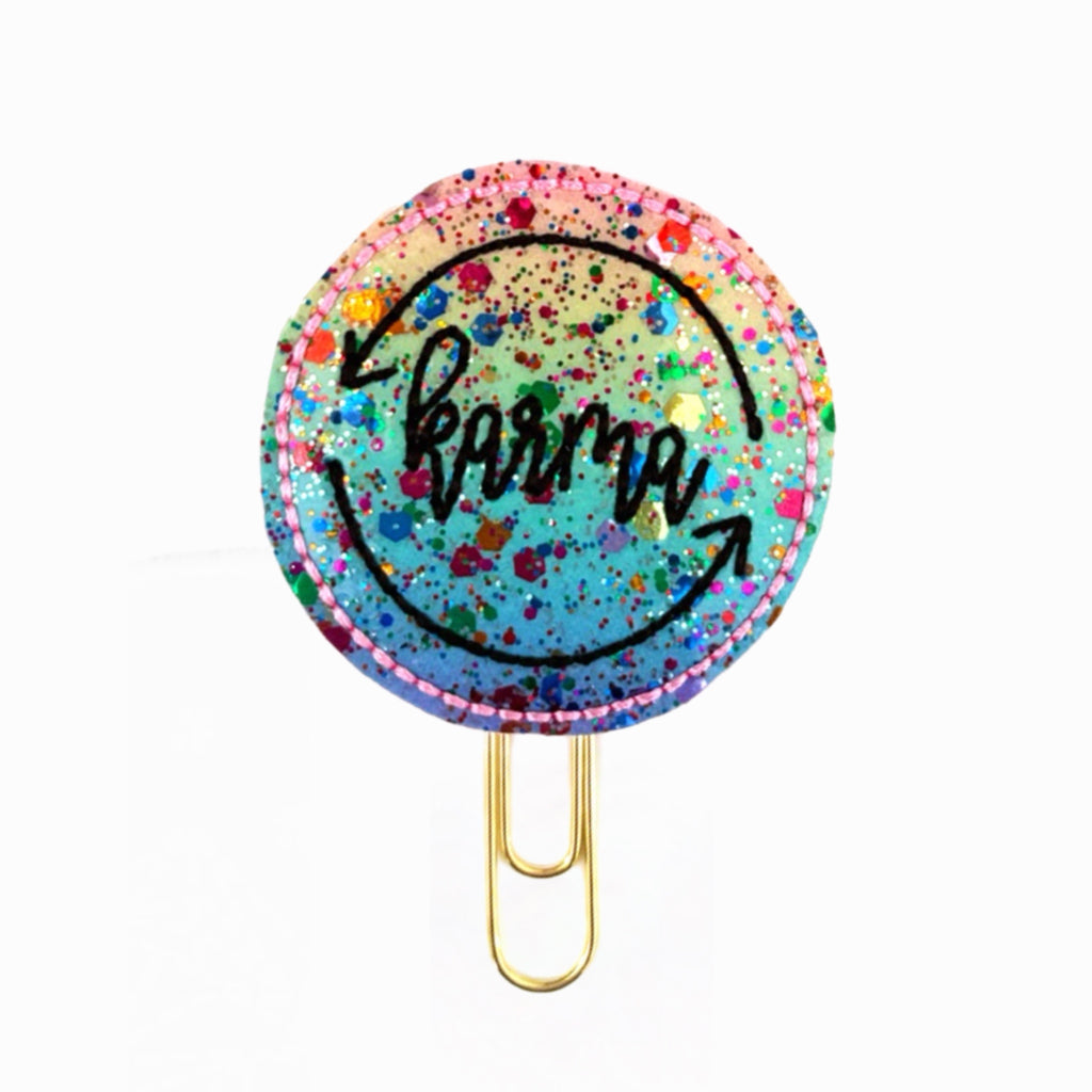 Multi colored embroidered "Karma" novelty paper clip, planner clip from Clip Chicks LLC.
