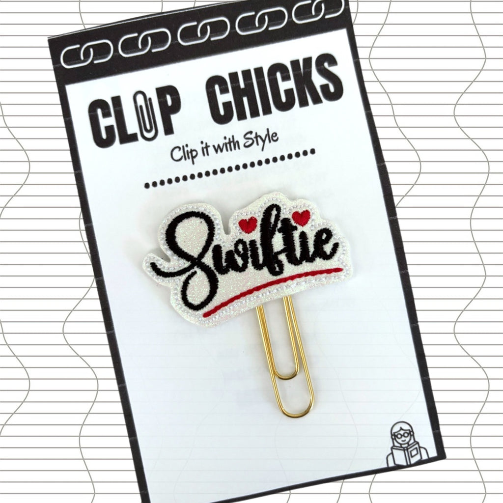 Taylor Swift inspired novelty paper clip from Clip Chicks. This Swiftie paper clip has little red hearts embroidered on it.