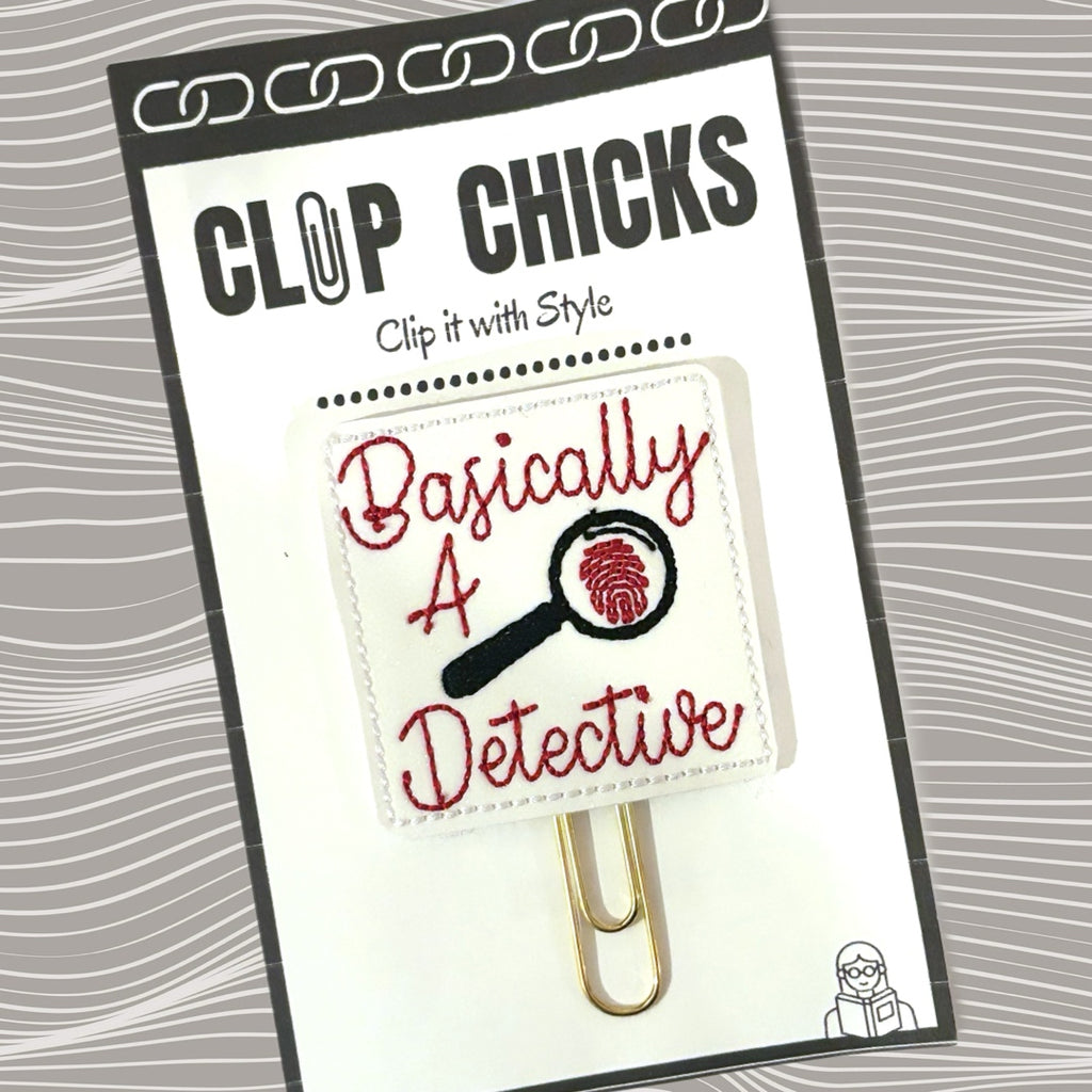 Clip Chicks' Basically a Detective embroidered novelty paper clip is shown in its package.