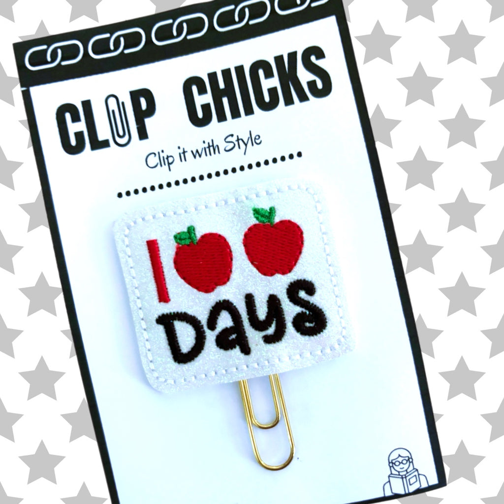 100 Days novelty paper clip from Clip Chicks is embroidered with red apples and the words, 100 Days.