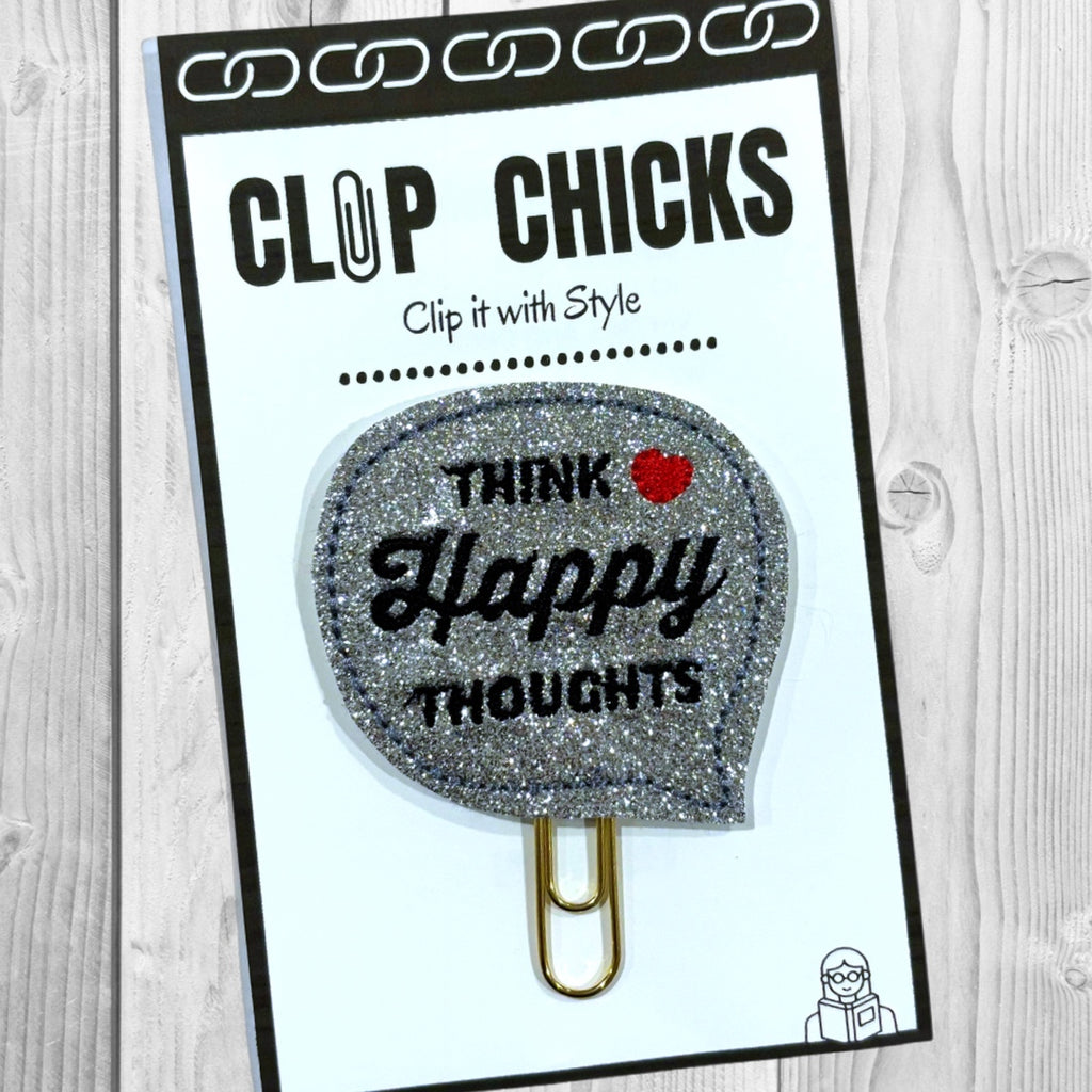 Clip Chicks' Think Happy Thoughts novelty paper clip in its package.