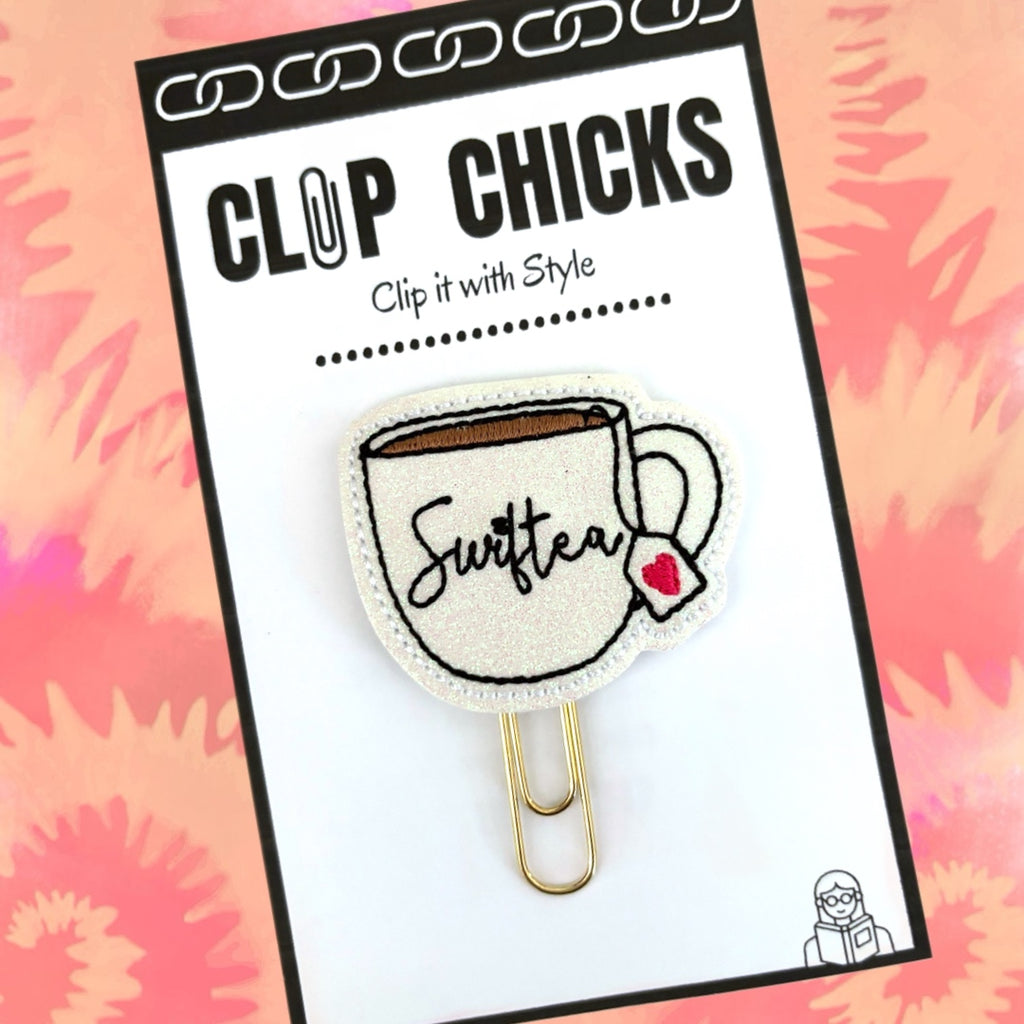 Clip Chicks' Swiftea novelty paper clip is shown in its package against a coral and pink tie-dyed background.