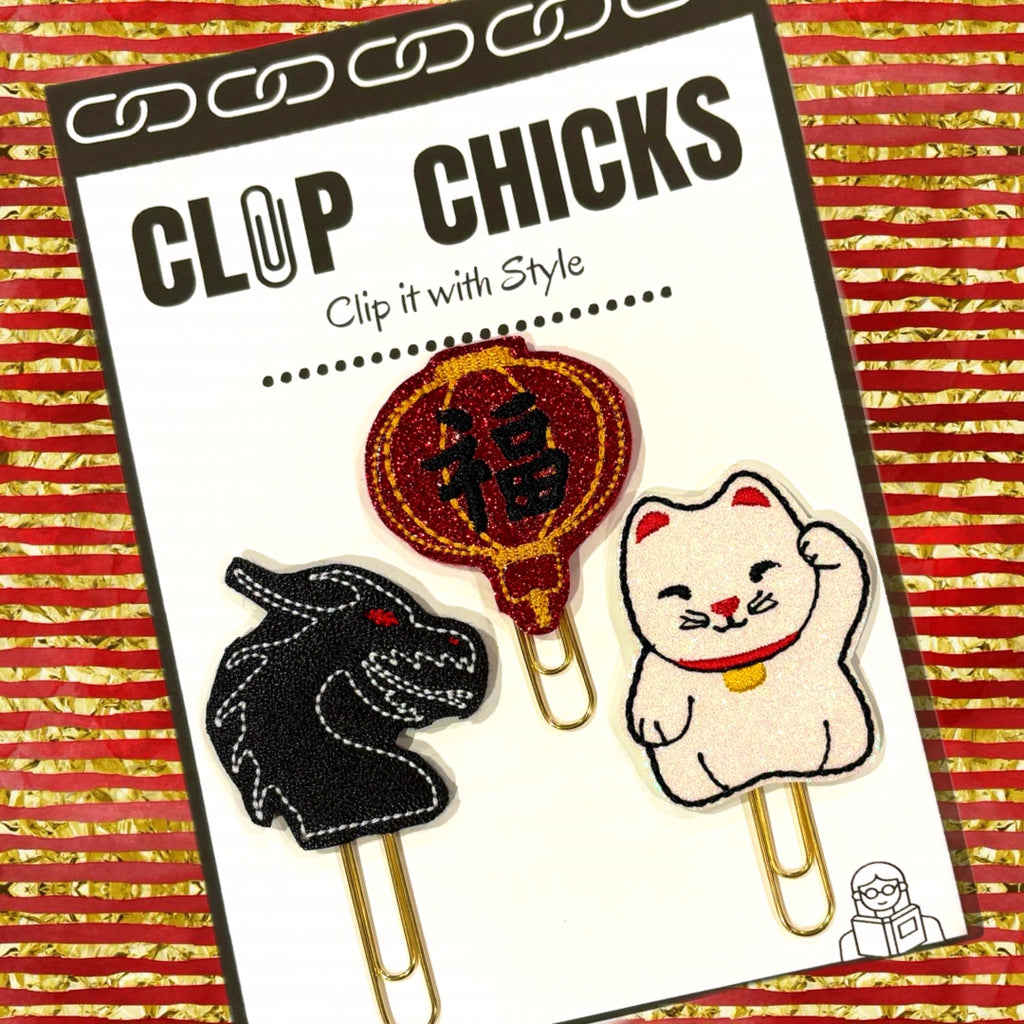 Clip chicks' Lunar New Year trio of novelty paper clips shown in their package.