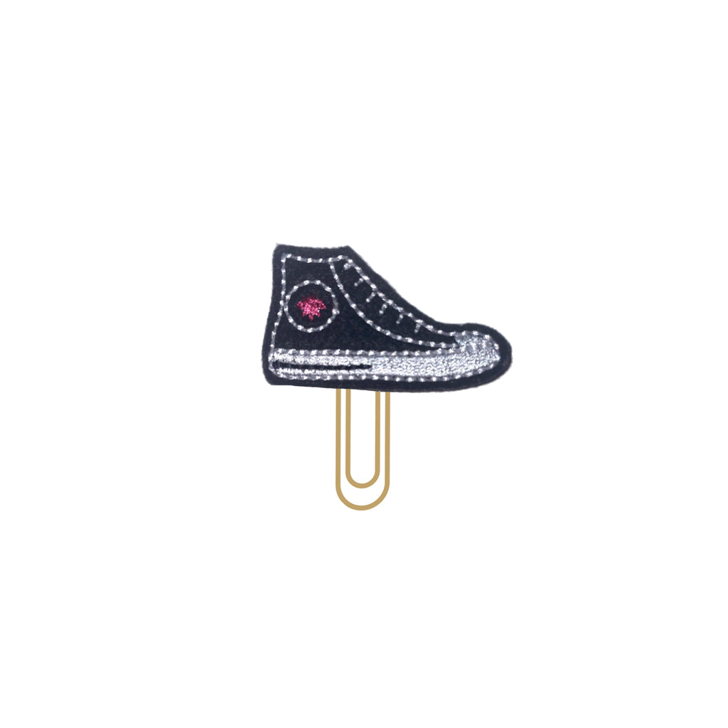 Clip Chicks' black sneaker novelty paper clip on a white background.