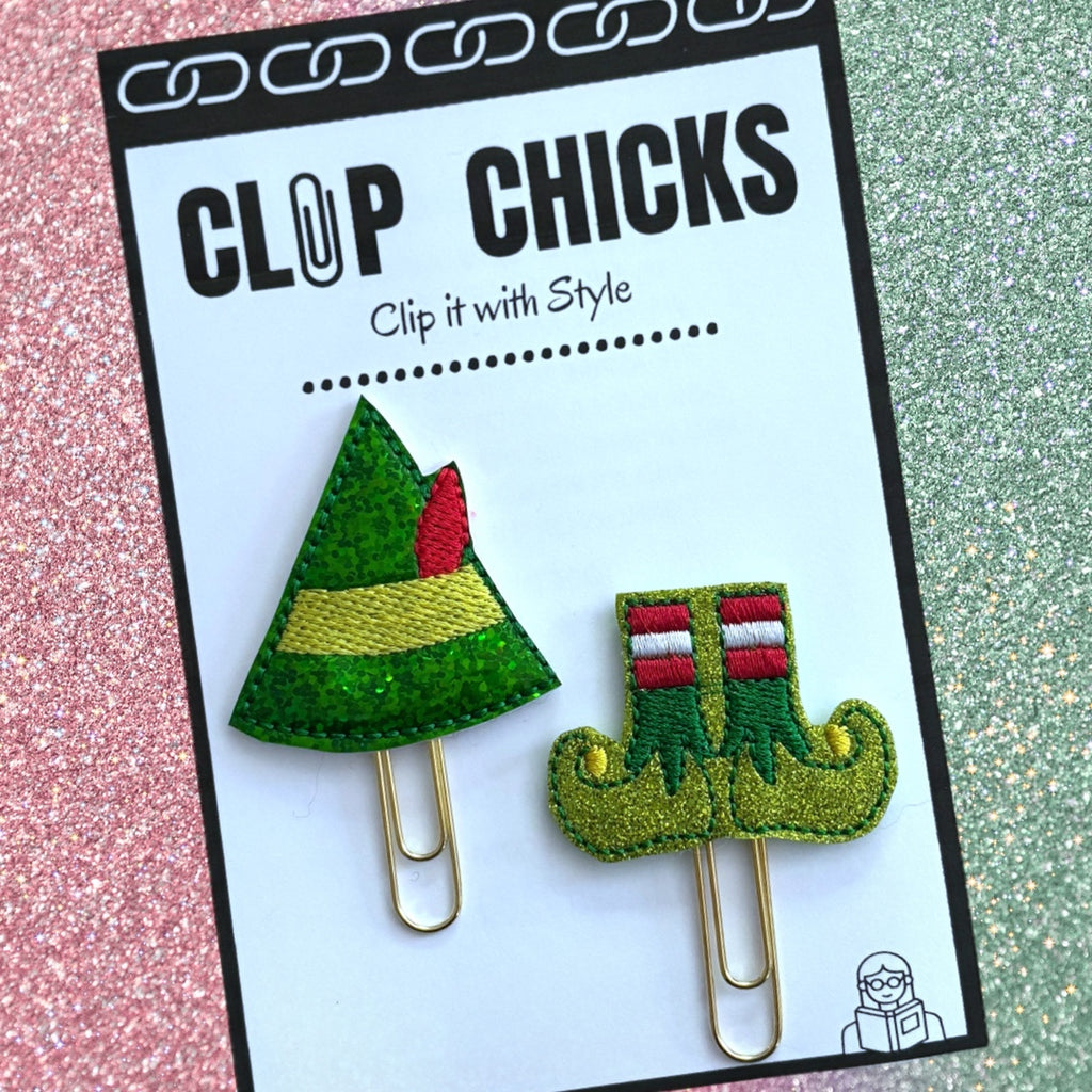 Clip Chicks' Elf Hat and Booties set of novelty paper clips are shown in their package.