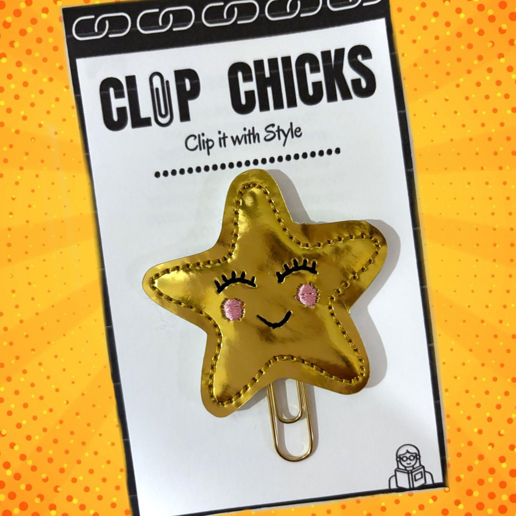 Clip Chicks' Gold Star novelty paper clip is shown in its packaging.