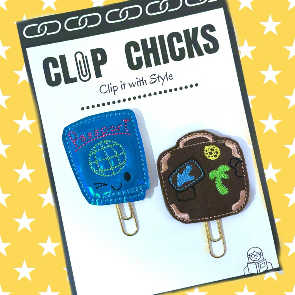 Clip Chicks' Passport and Suitcase set of novelty paper clip are shown in their package.