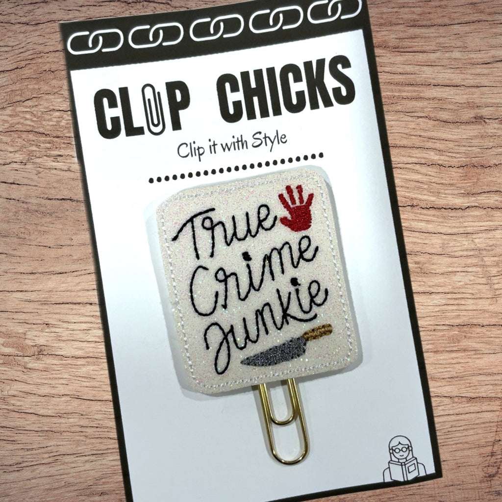 Clip chicks' True Crime Junkie novelty paper clip in its package.