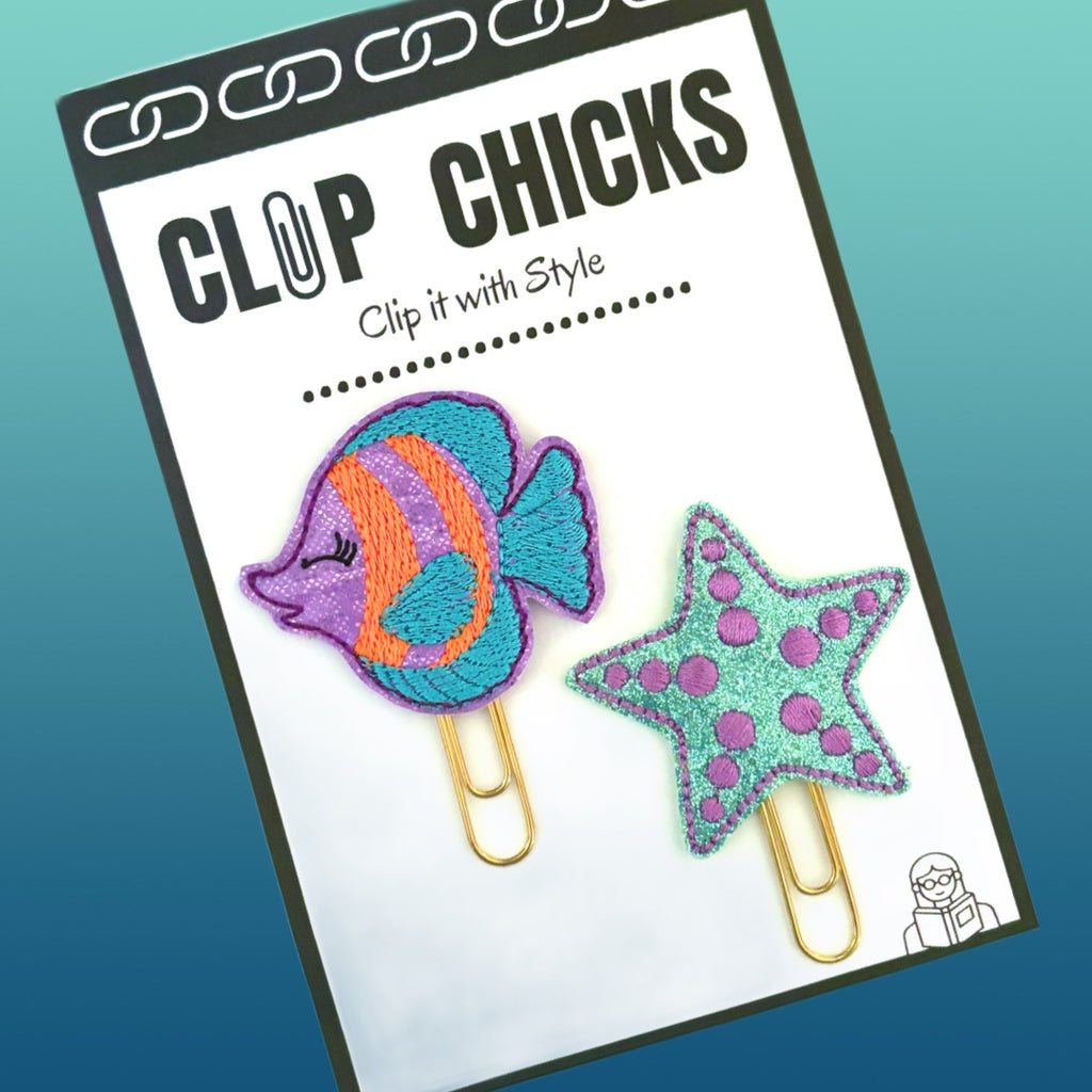 Starfish and Tropical Fish set of novelty paper clips from Clip Chicks are shown in their cute packaging, ready for gift giving.