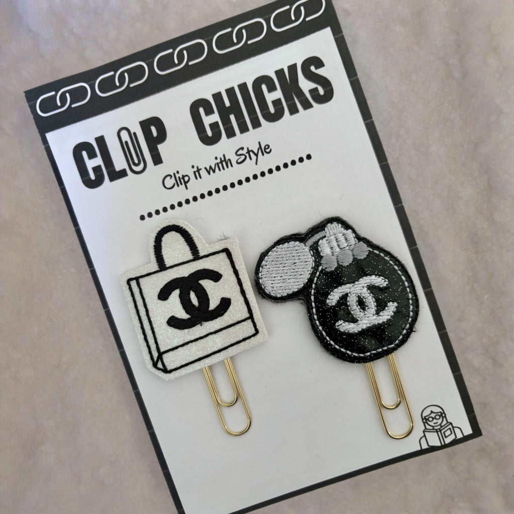 Clip Chicks' Coco Chanel inspired set of novelty paper clips in the packaging it is shipped in.