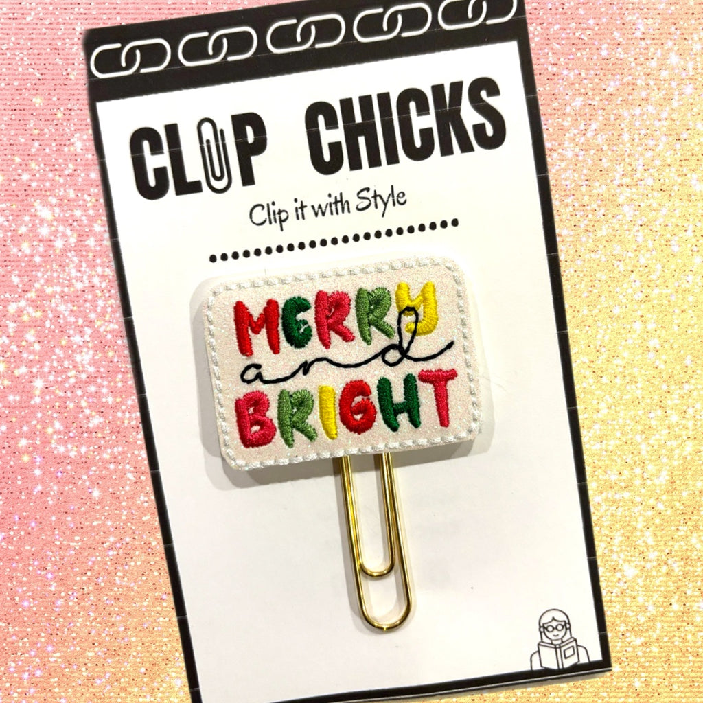 Clip Chicks' Merry and Bright Christmas themed novelty paper clip is shown in its package.