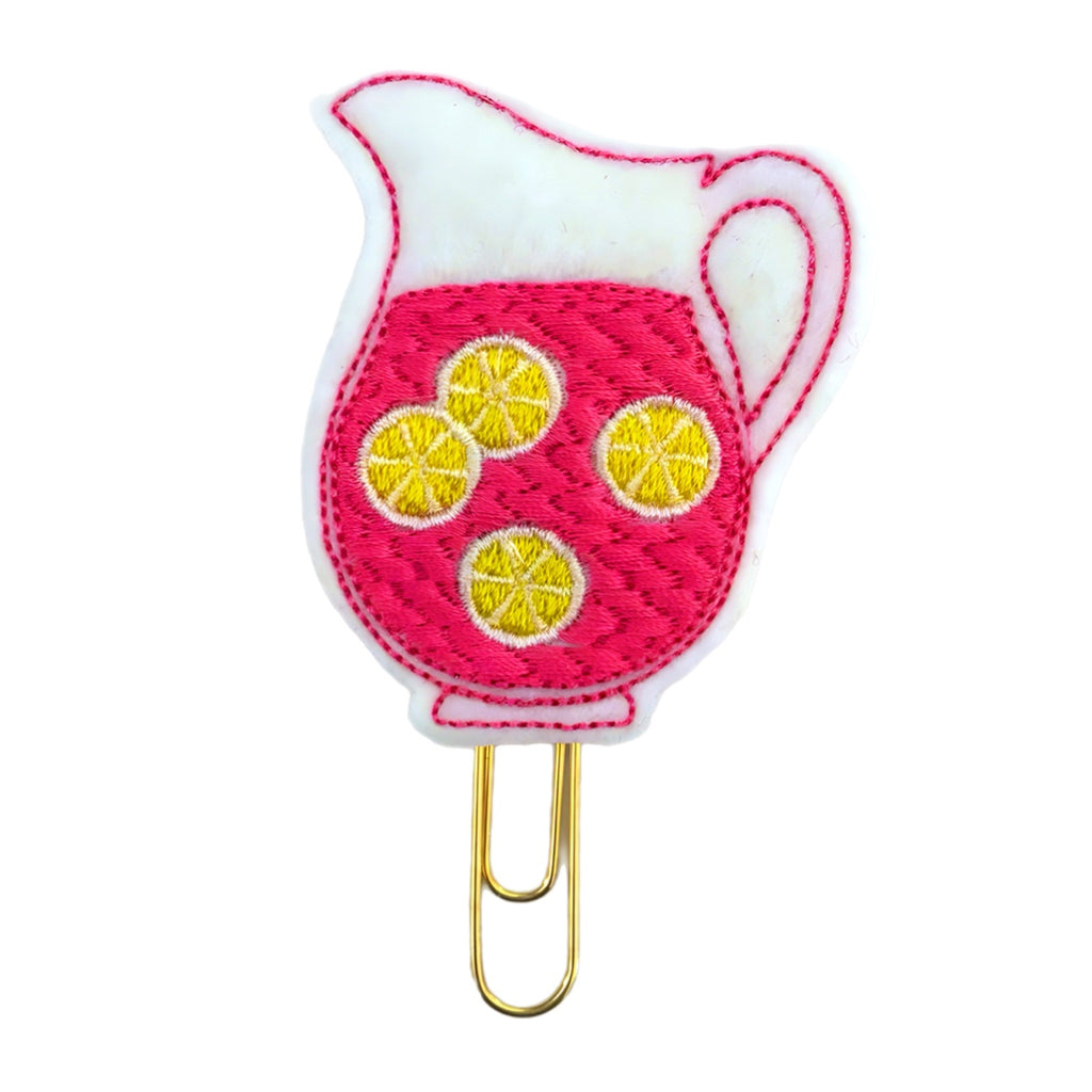 Pink Lemonade novelty paper clip from Clip Chicks, shaped like a pitcher of pink lemonade with tiny lemon slices embroidered on it. Great bookmark, planner clip and organizer.