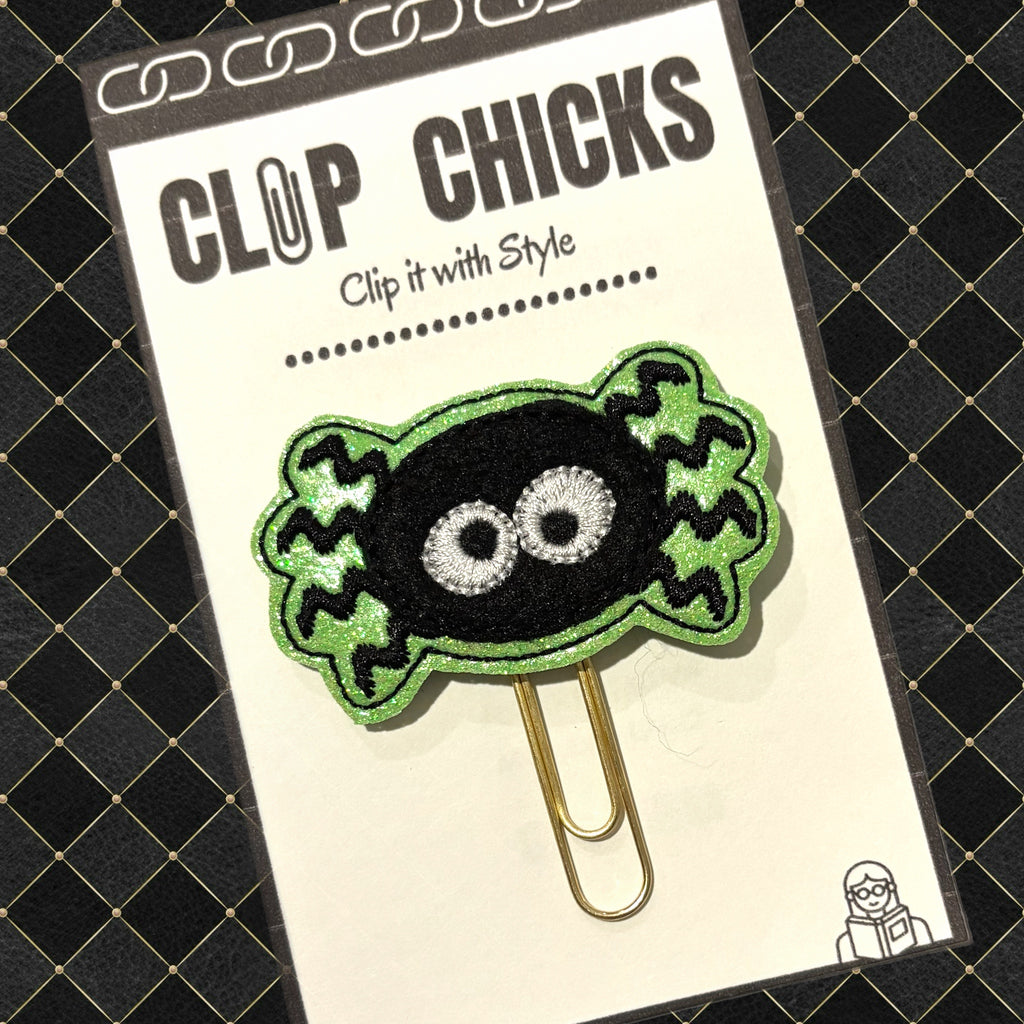 Clip Chicks LLC's Spooky Sparkly Spider novelty paper clip is black and grren and shown in the package.