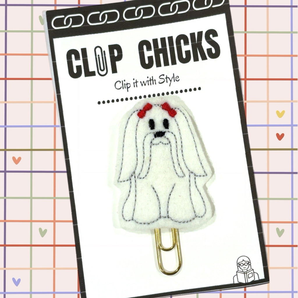 Clip Chicks' Maltese novelty paper clip is shown in its package.