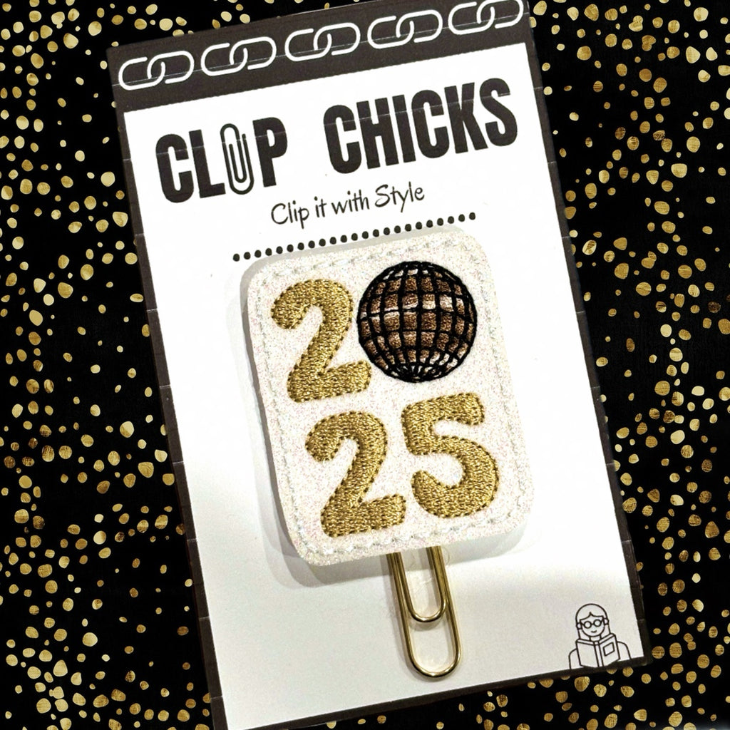 2025 Novelty Paper Clip is gold, black and white.