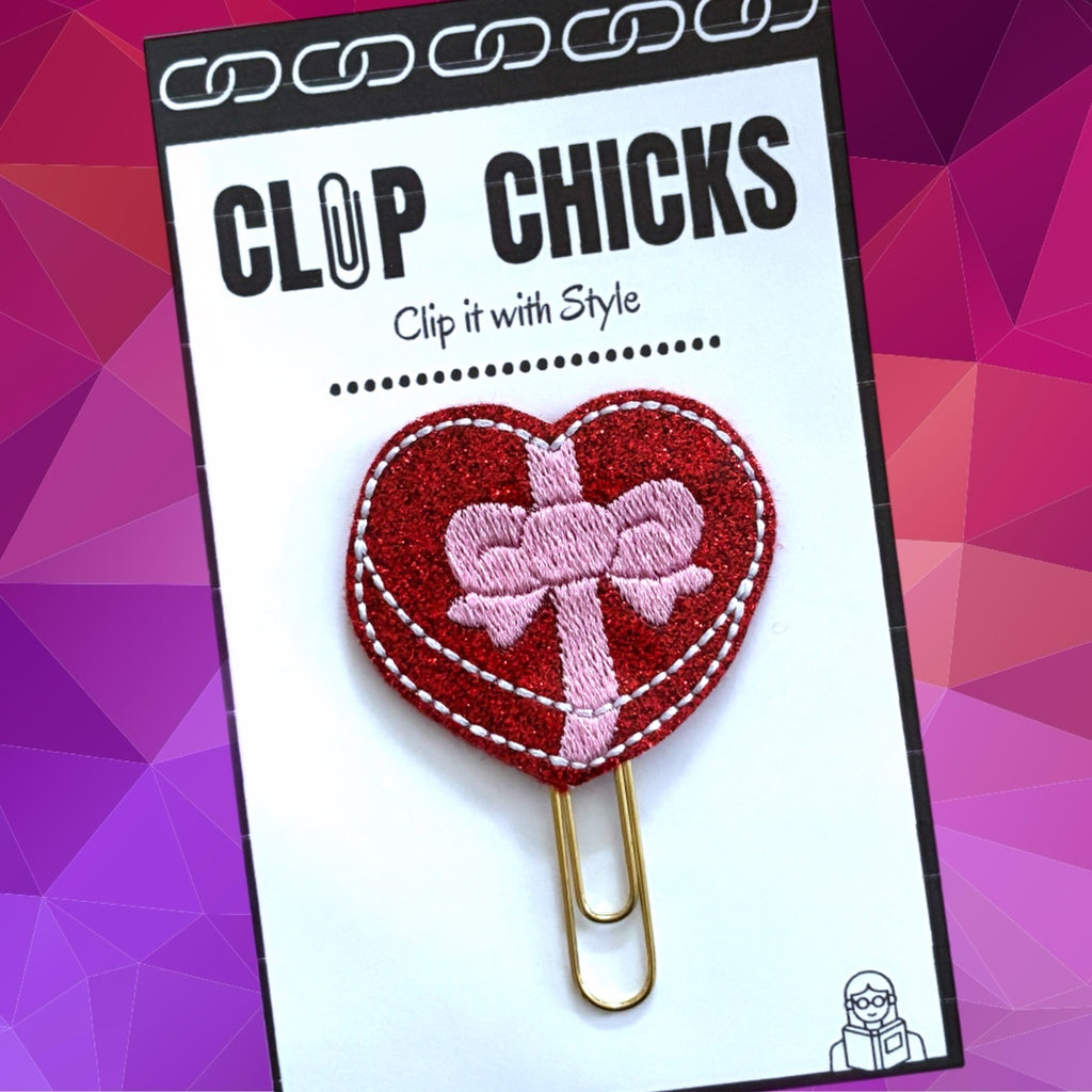 Clip Chicks' Box of Chocolates novelty paper clip is shown in its package.