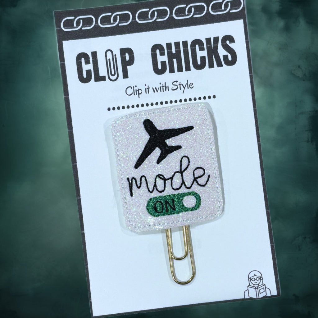 Clip Chicks' Airplane Mode novelty paper clip  is shown in its package.