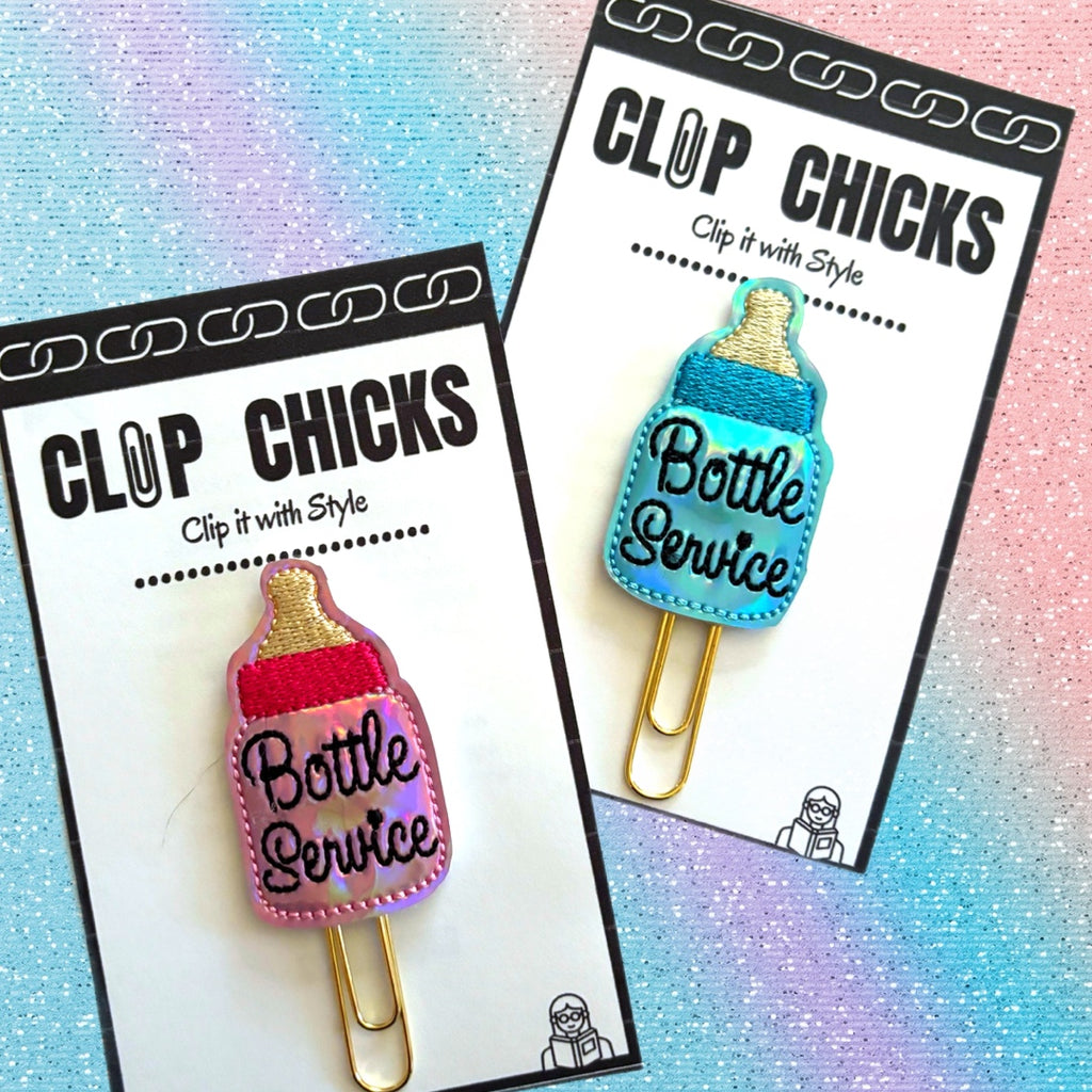 A pink and a blue Bottle Service novelty paper clips are shown in their packaging.