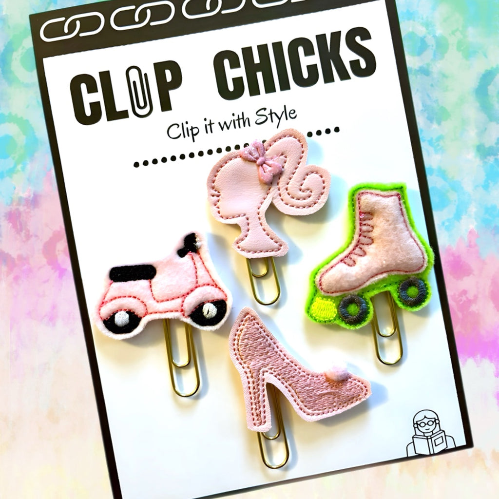 Clip chicks' Pink Doll and Accessory Set of four Barbie-inspired novelty paper clips are shown in its package.