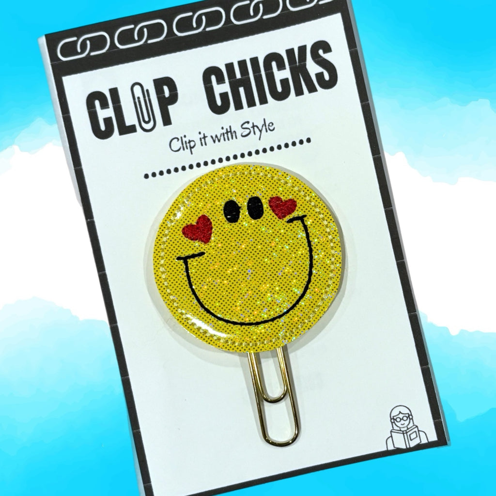 Clip Chicks' Happy Face novelty paper clip is shown in its package.