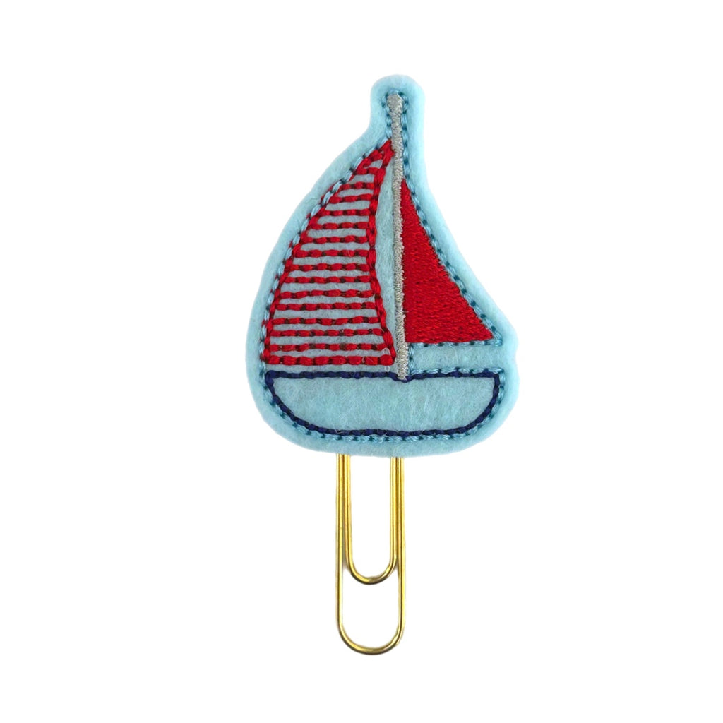 Clip chicks' Sailboat novelty paper clip, shaped like a blue boat with read sails; great as a bookmark, gift, planner clip or paper organizer.