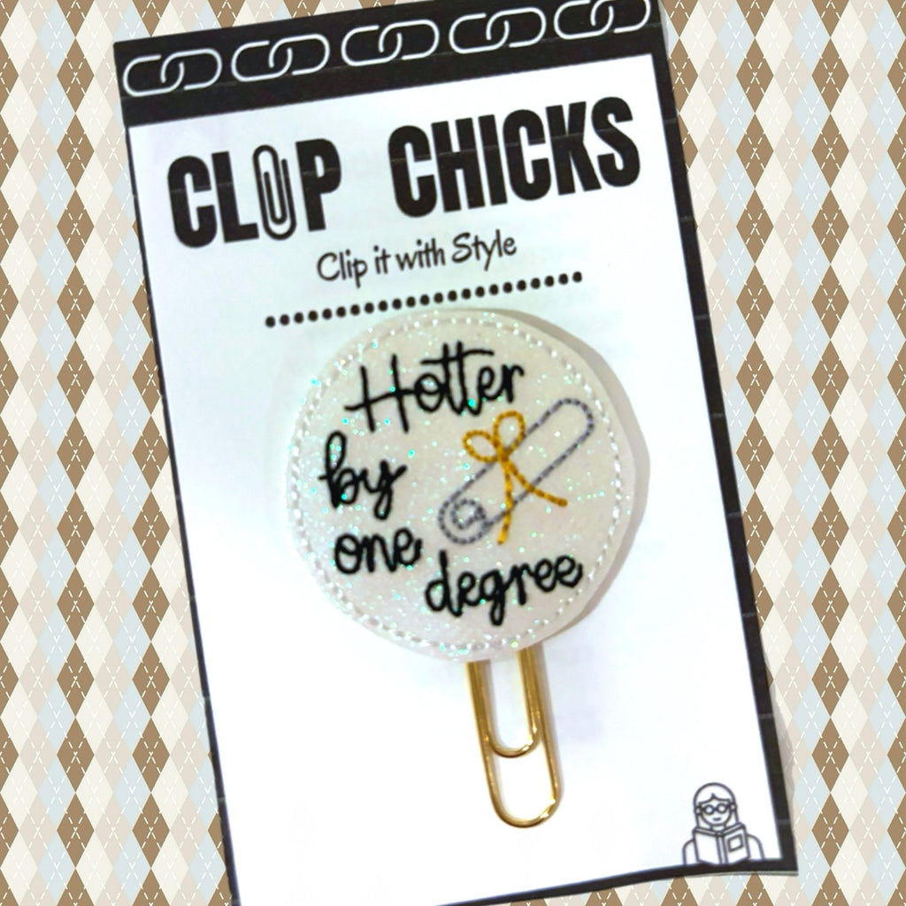 Hotter by One Degree novelty paper clip by Clip Chicks is shown in it package, making a cute graduation gift or gift embellishment. 