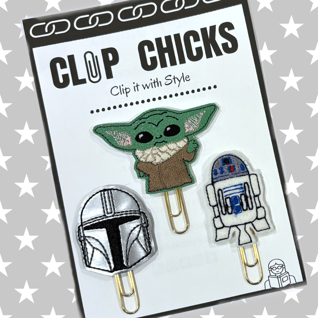 Clip Chicks' Galactic trio of novelty paper clips are shown in their package.