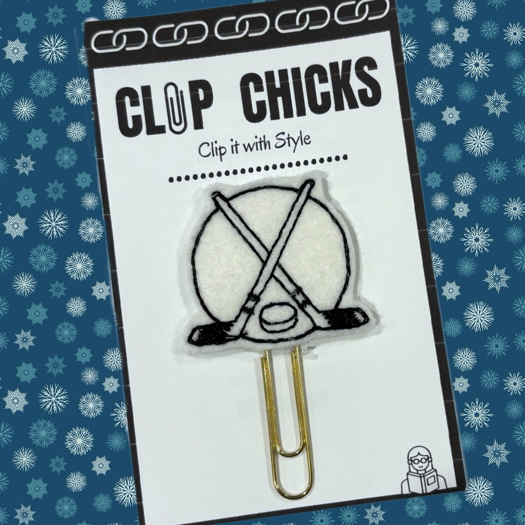 Clip Chicks' Hockey Puck novelty paper clip is shown in packaging.