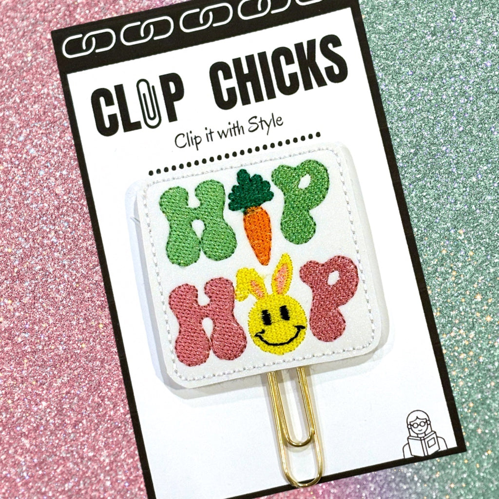 Clip chicks Hip Hop novelty paper clip is  shown in its packaging.