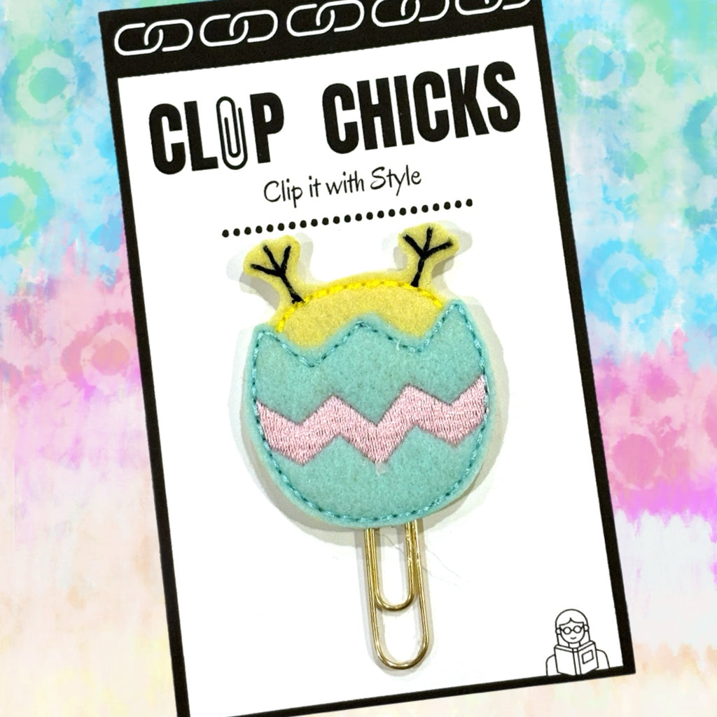 Clip Chicks' Hatching Egg paper clip is shown in its package.