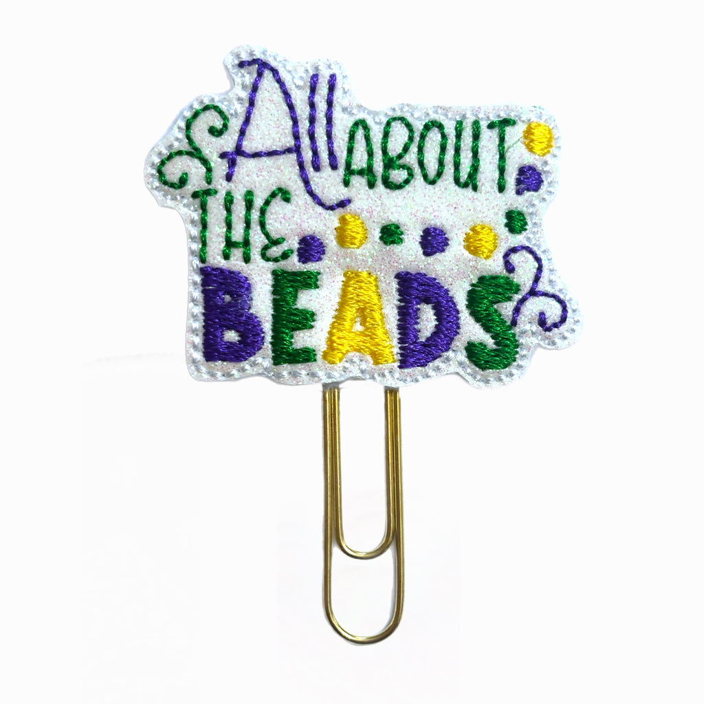 All About the Beads novelty paper clip from Clip Chicks LLC for Mardi Gras celebrations.