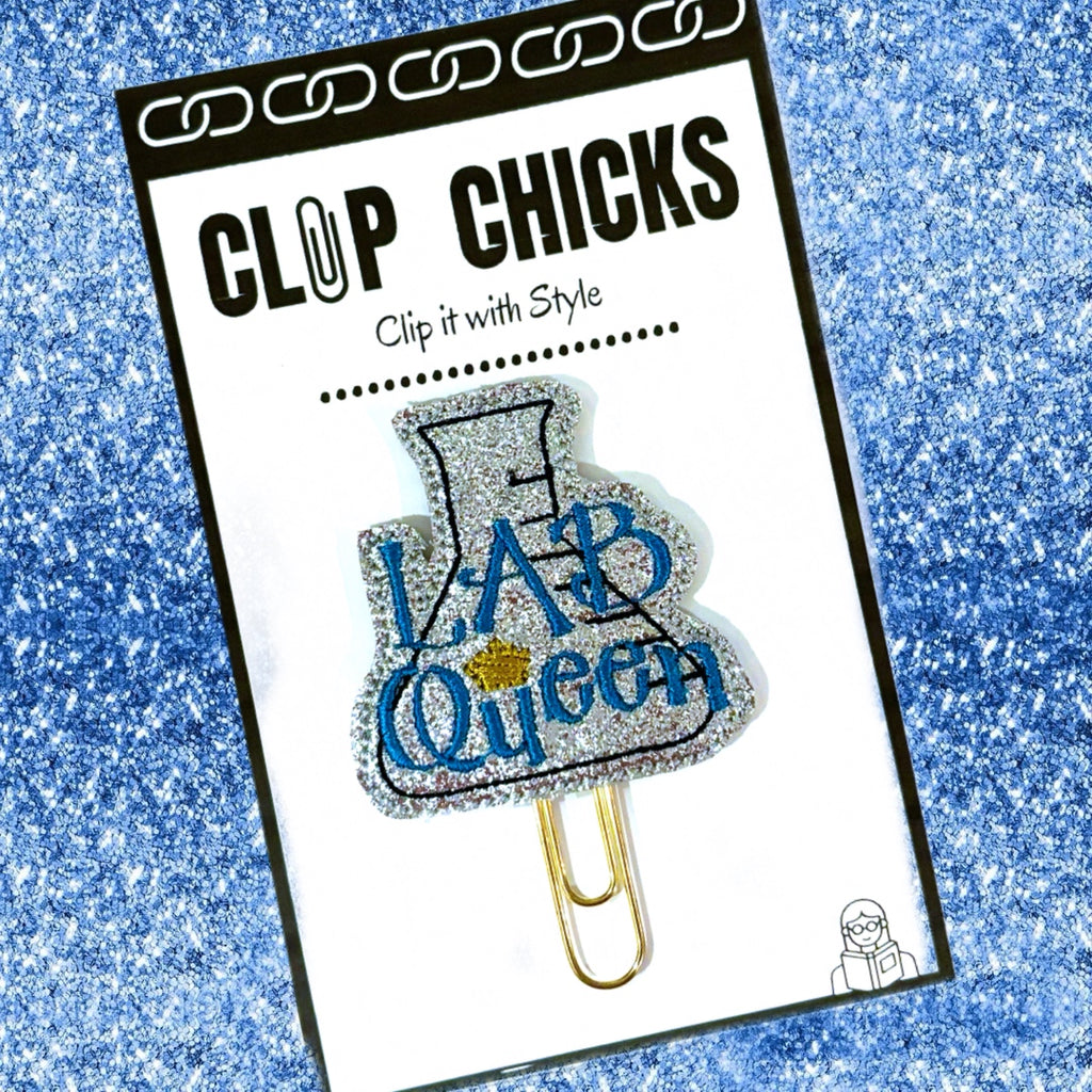 Clip Clicks' Lab Queen novelty paper clip is shown in its package.