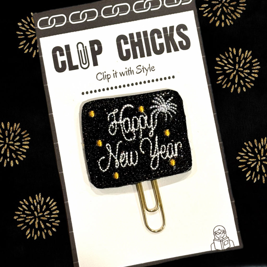 Happy new Year Clip Chicks novelty paper clip is shown in package on black and gold background.