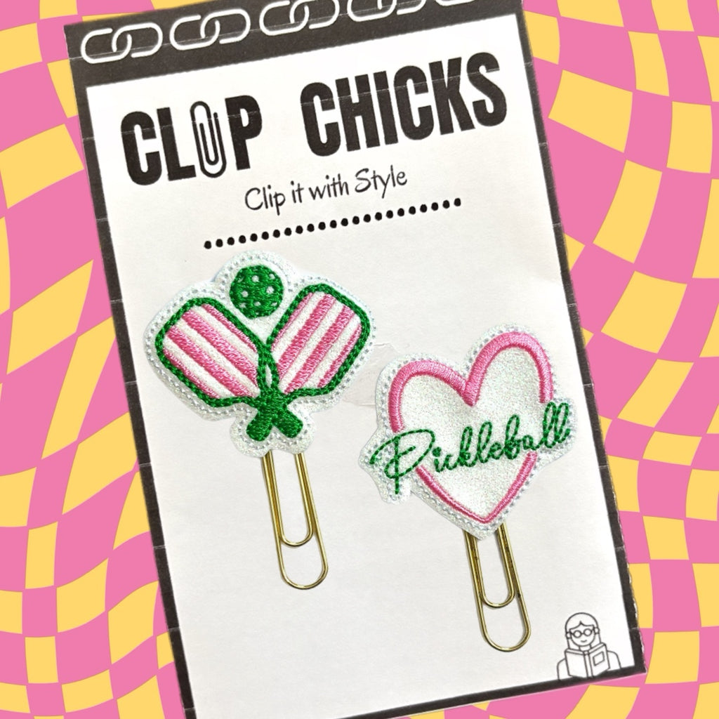 The cutest set of Pickleball themed novelty paper clips from Clip Chicks are shown in their package.