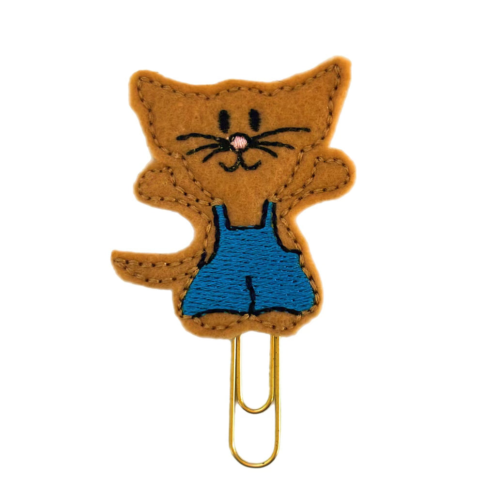 a cute embroidered felt mouse is attached to a gold toned paper clip by Clip Chicks, and used as a bookmark or planner clip.