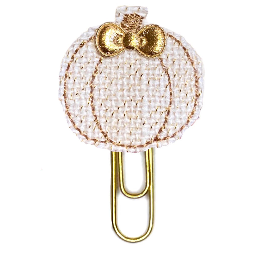 Light beige burlap pumpkin novelty paper clip.