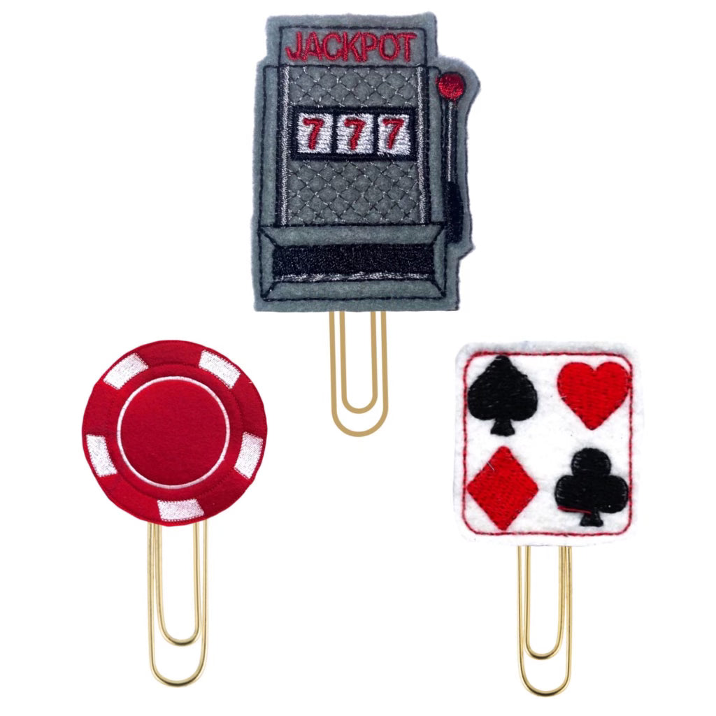 A slot machine, a red casino hip and a playing card novelty paper clip makes up this Casino Trio from Clip Chicks.