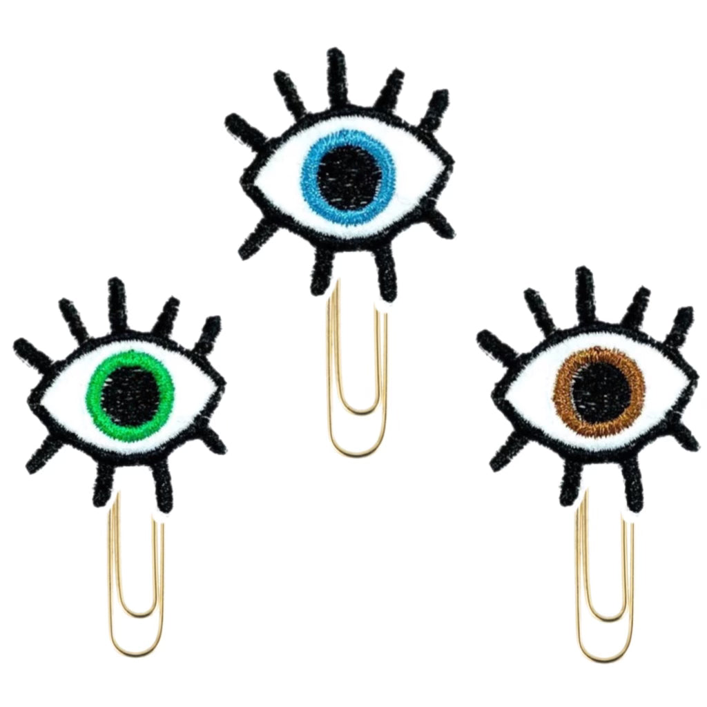 Evil Eye novelty apaper clips from Clip Chicks are shown with Blue, green and brown eyes.