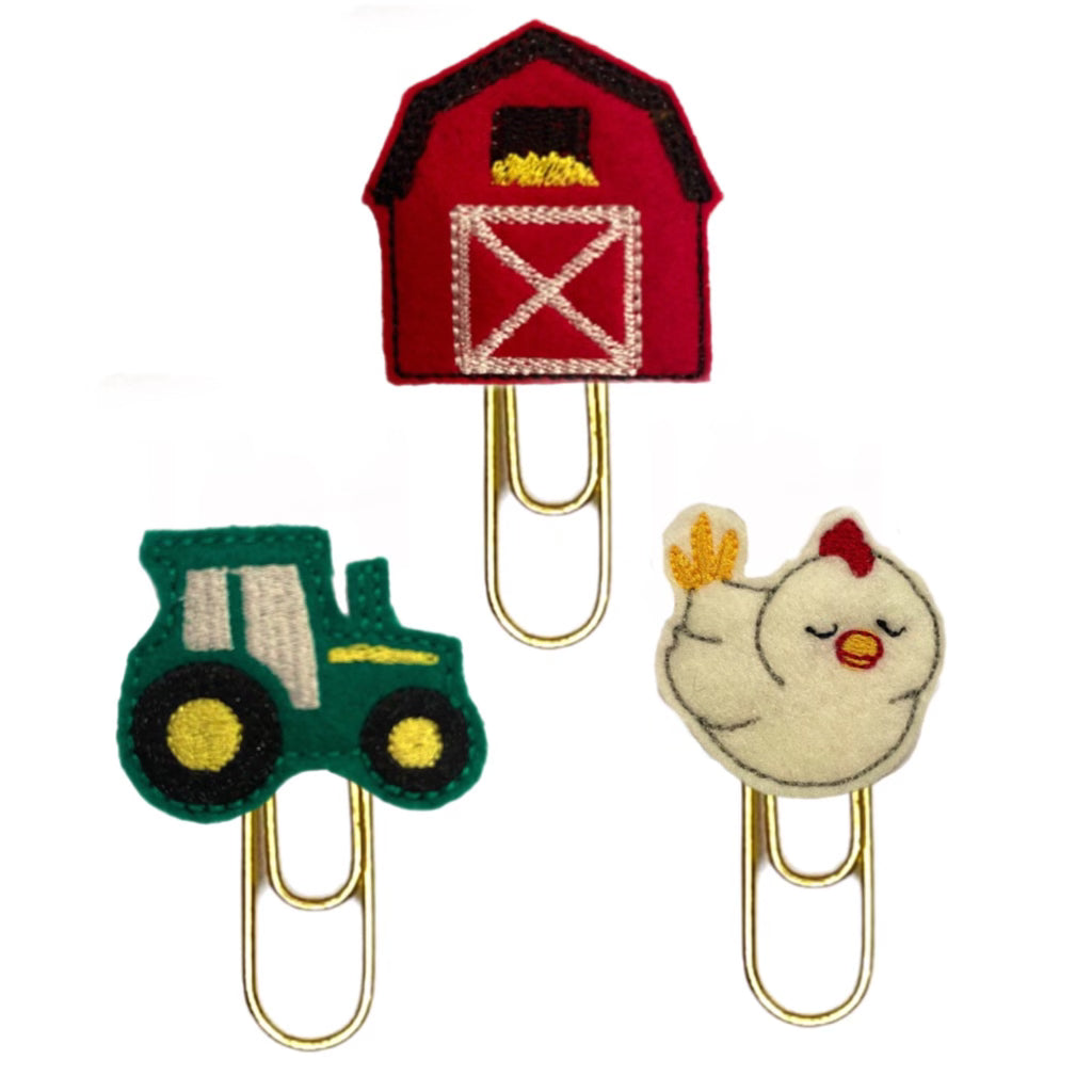 Farm Life set of three novelty paper clip from Clip Chicks include a red barn, a green tractor and a hen.