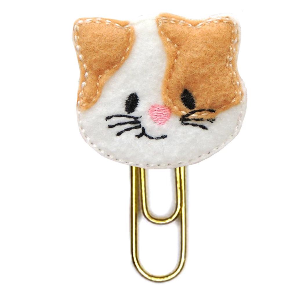 Kitty Cat novelty paper clip on a white background.