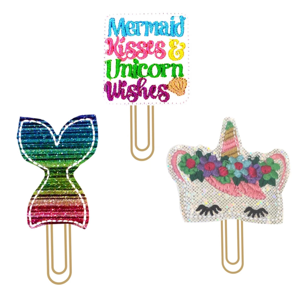 Clip Chicks' Mermaids and Unicorns set of three novelty paper clips are made from shimmery, glittery vinyl and felt before being attached to gold toned paper clips, making for a fun way to bookmark your novels and notebooks.