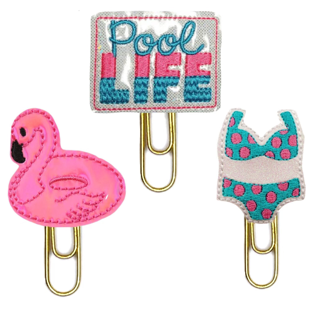 Clip Chicks' Pool Life trio of novelty paper clips, one flamingo float, one bikini and one Pool Life clip.