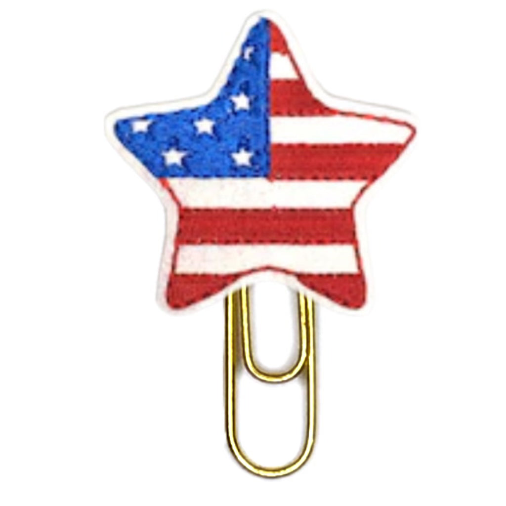 Clip Chicks red, white and blue star novelty paper clip is made from felt, vinyl and embroidery thread before being attached to a gold toned paper clip.