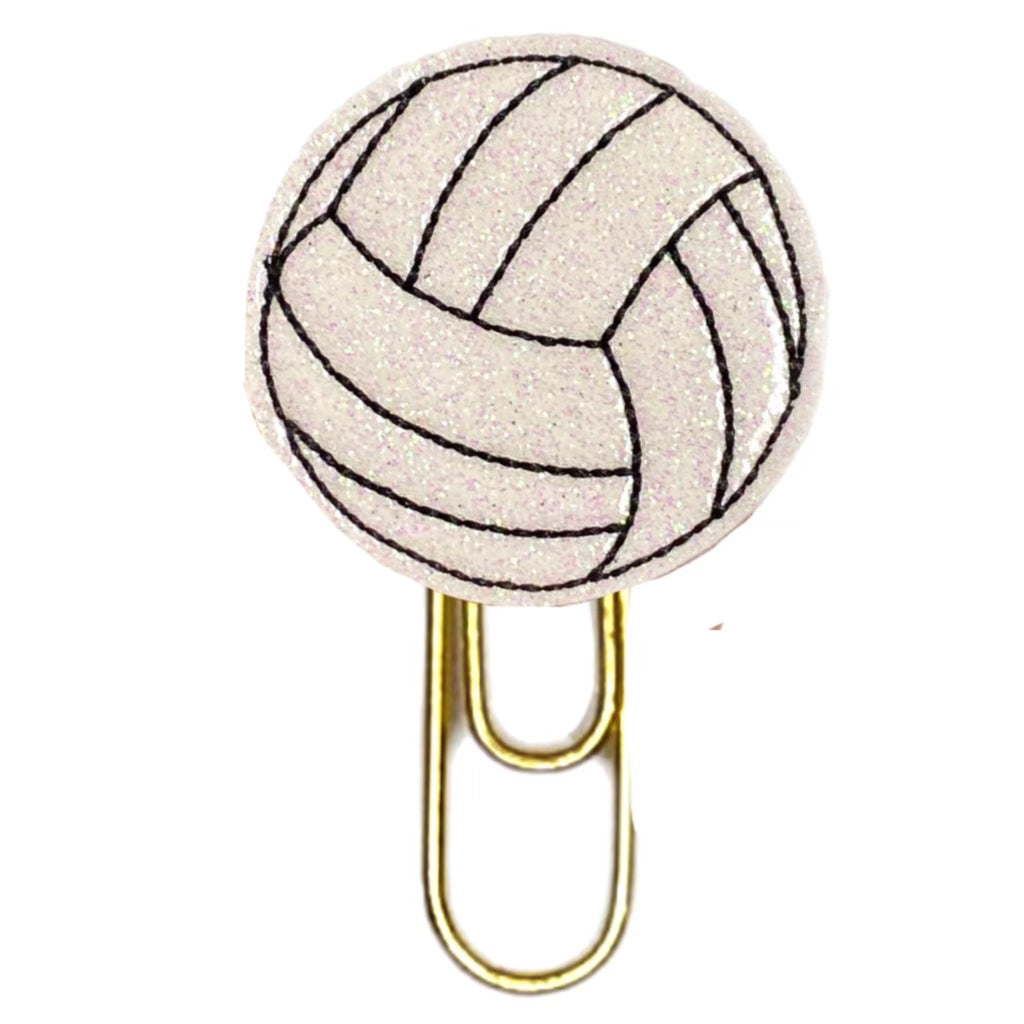 A volleyball shaped novelty paper clip is shown from Clip Chicks.