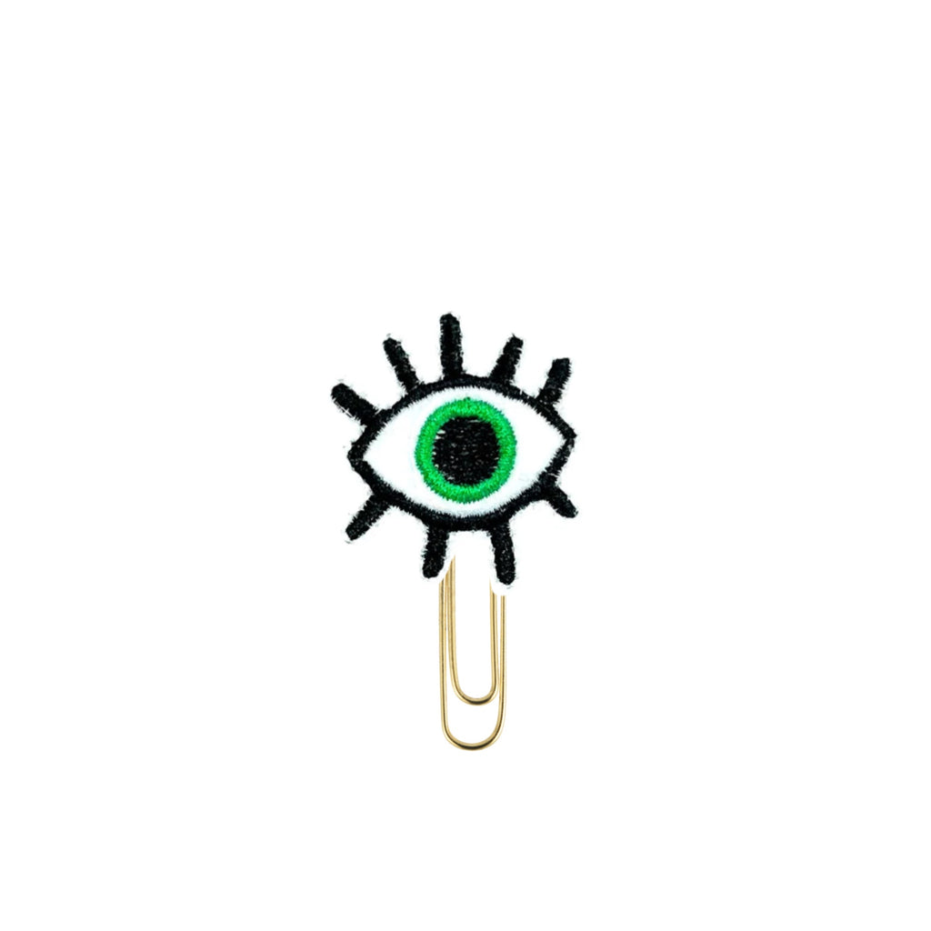 Green evil eye novelty paper clip from Clip Chicks.